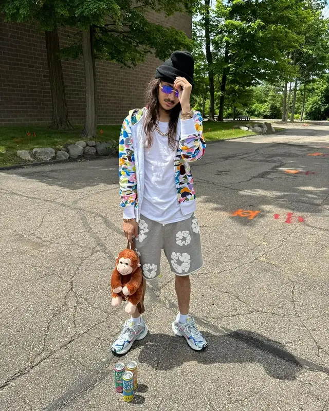 BabyTron outfit in Bape, Denim Tears, and Cartier, 2024
