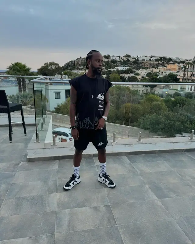 Popcaan outfit in Civil Regime and Nike, 2024