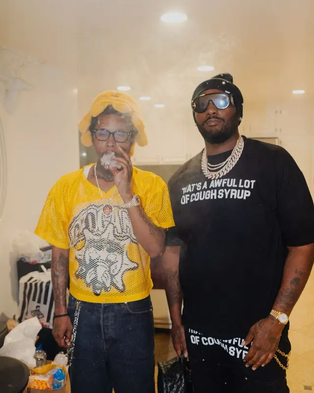 Peezy outfit in Cough Syrup, Loewe, and Nike, 2024