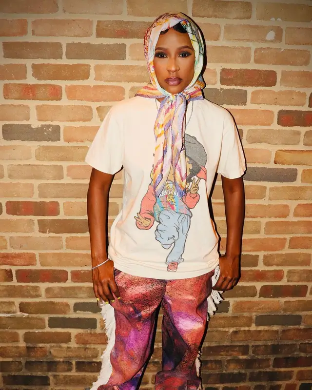 DeJ Loaf outfit in Adidas, Disney, and Loewe, 2024