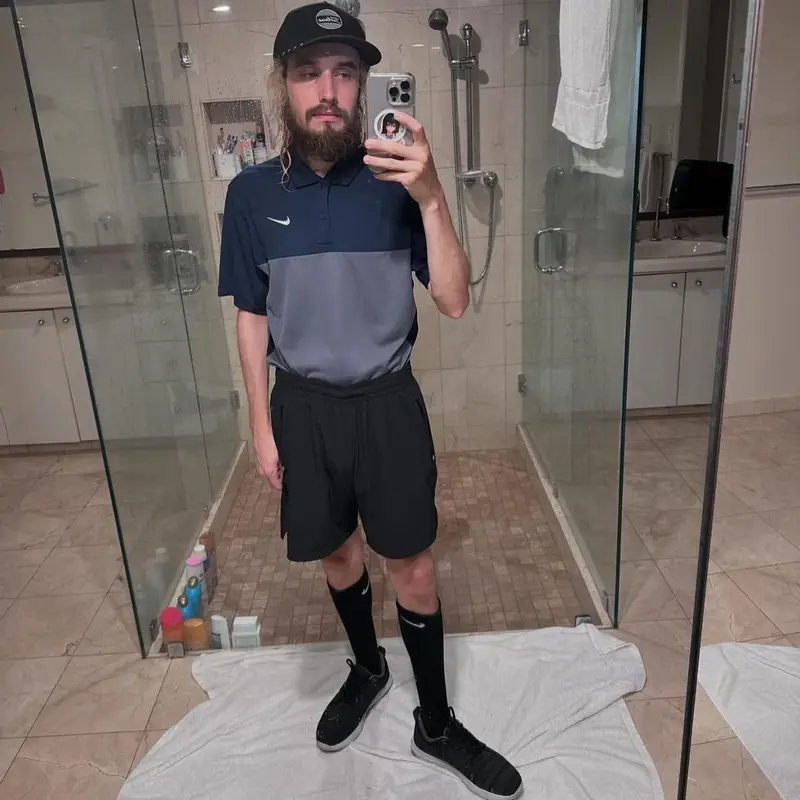 Pouya outfit in Nike and Titleist, 2024