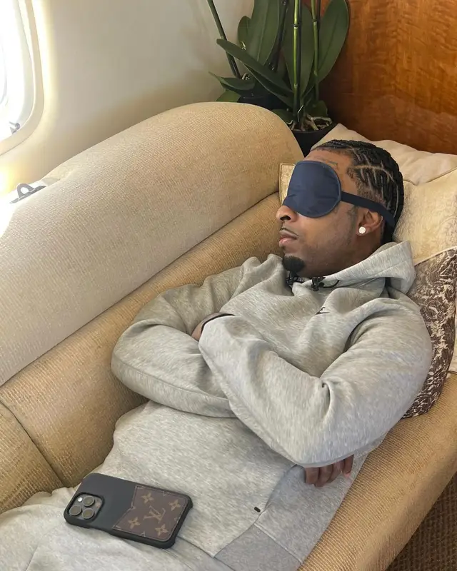 21 Savage outfit in Nike and Louis Vuitton, 2024