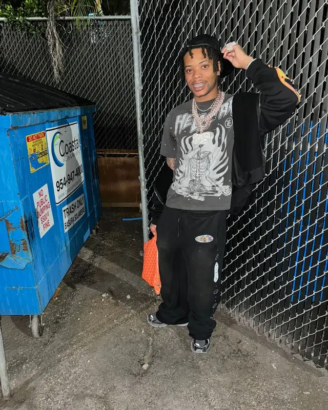 Lil Migo outfit in Balenciaga, Goyard, and Bally, 2024