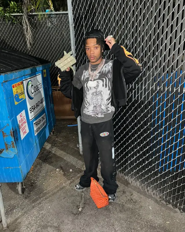 Lil Migo outfit in Balenciaga, Goyard, and Bally, 2024