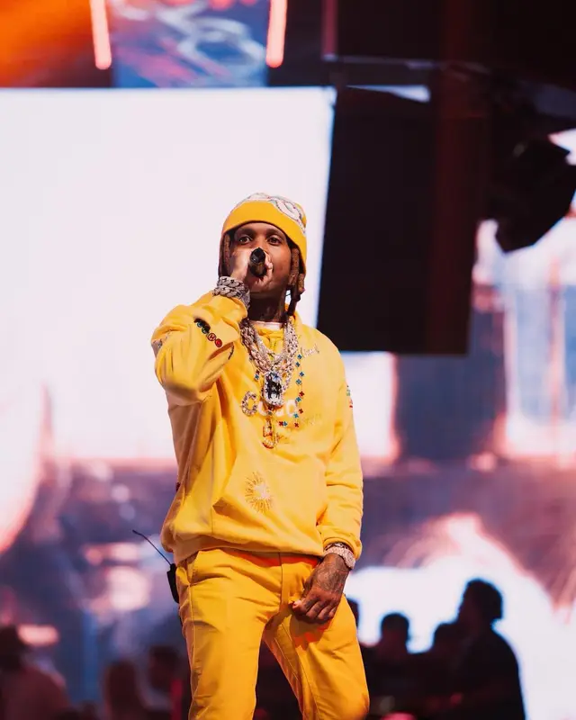 Lil Durk outfit in Chanel, Gallery Dept., and Pharrell Williams, 2024