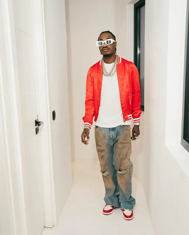 Lil Tjay outfit in Louis Vuitton, Acne Studios, and Loewe, 2024