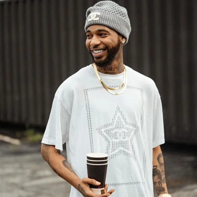 Key Glock outfit in Jordan, Chanel, and Off-White, 2024