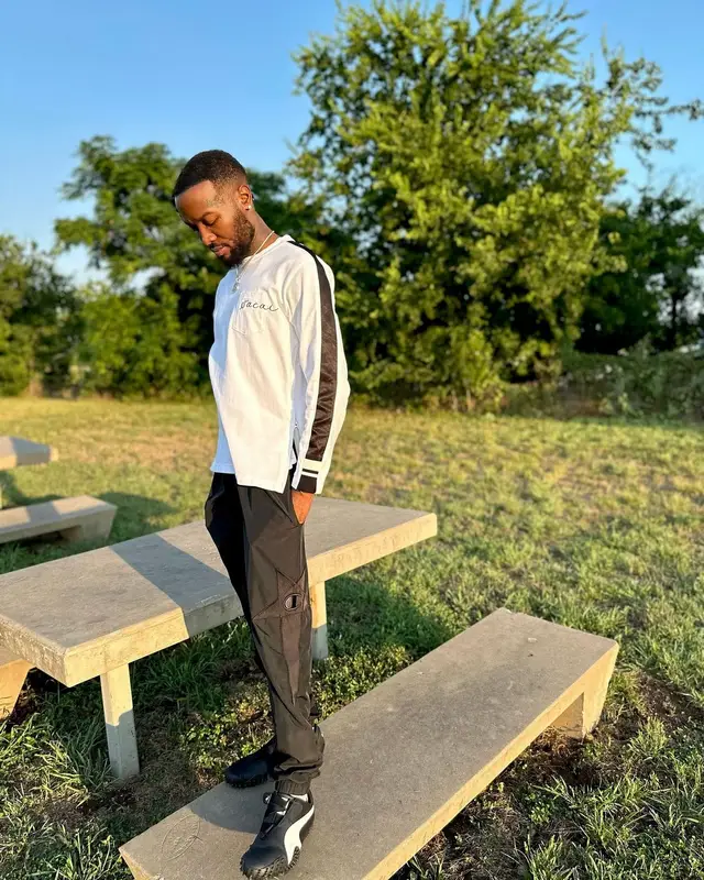 Shy Glizzy outfit in Sacai, Rick Owens, and Champion, 2024