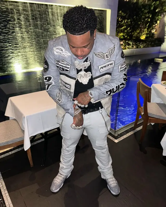 Finesse2tymes outfit in Majestic Athletic, Jordan, and Louis Vuitton, 2024