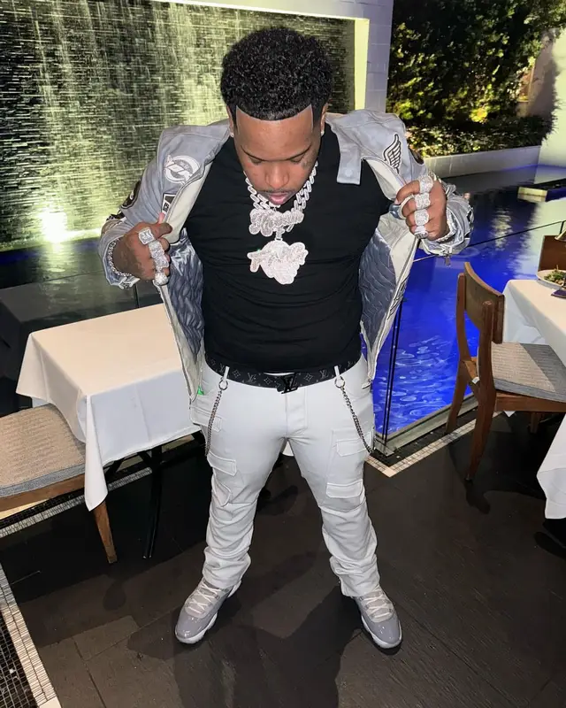 Finesse2tymes outfit in Majestic Athletic, Jordan, and Louis Vuitton, 2024