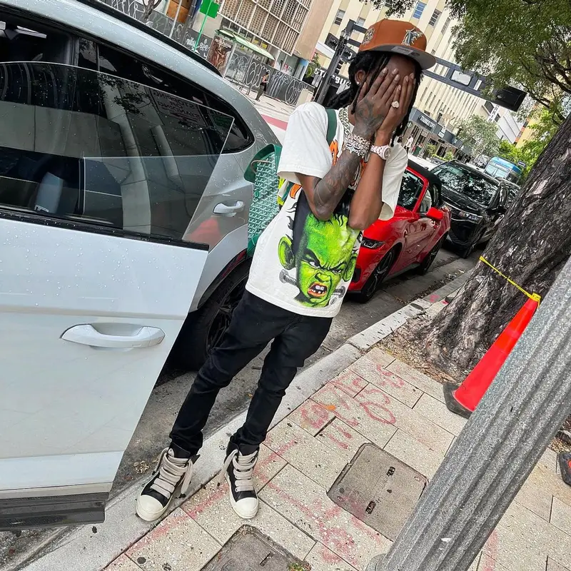 Baby Smoove outfit in Rick Owens, Goyard, and New Era, 2024