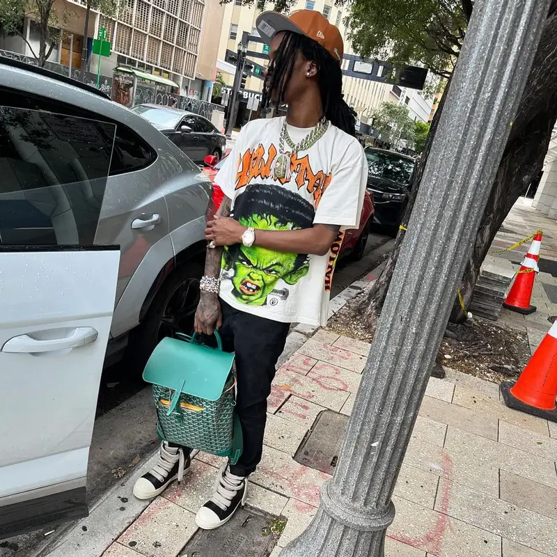 Baby Smoove outfit in Rick Owens, Goyard, and New Era, 2024