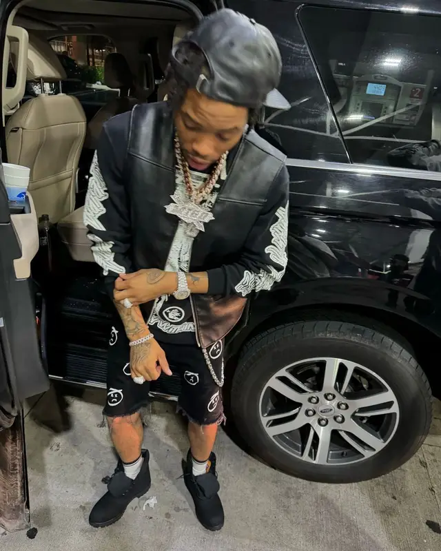 Lil Migo outfit in Supreme, Timberland, and Bally, 2024