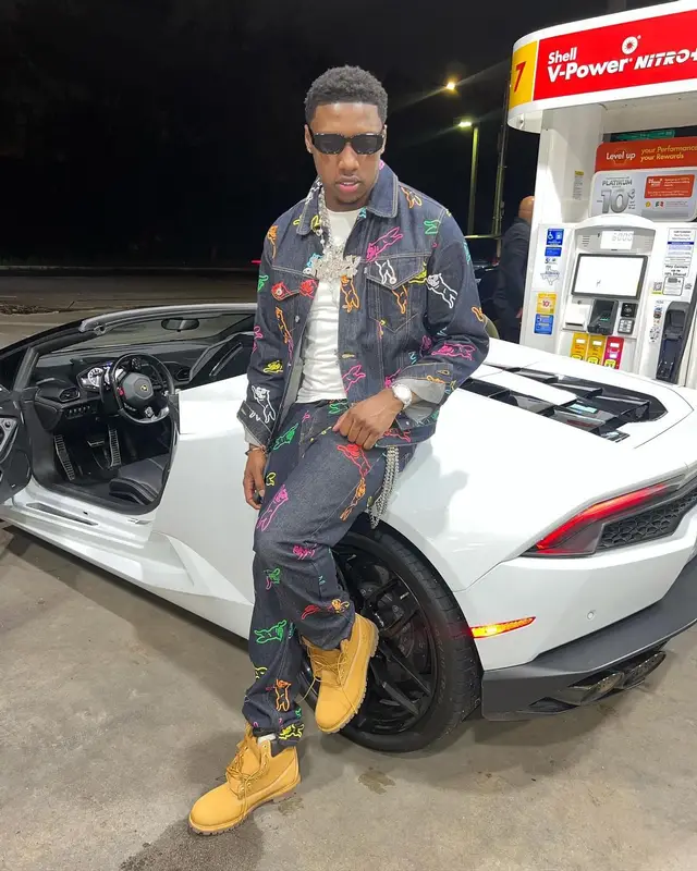 Rob49 outfit in IceCream, Timberland, and Prada, 2024