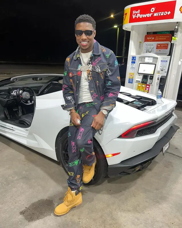 Rob49 outfit in IceCream, Timberland, and Prada, 2024