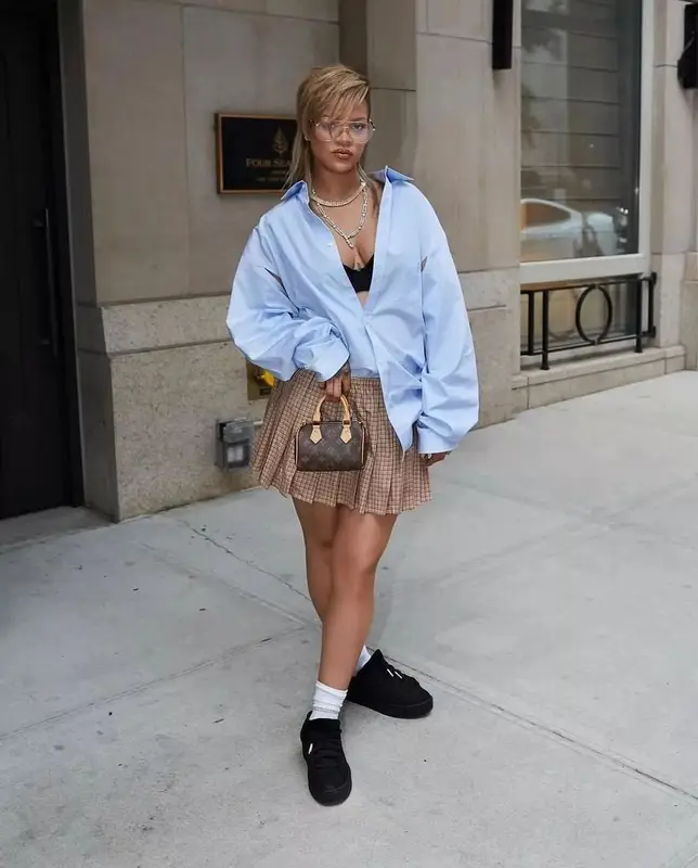 Rihanna outfit in Miu Miu, Puma, and Louis Vuitton, 2024
