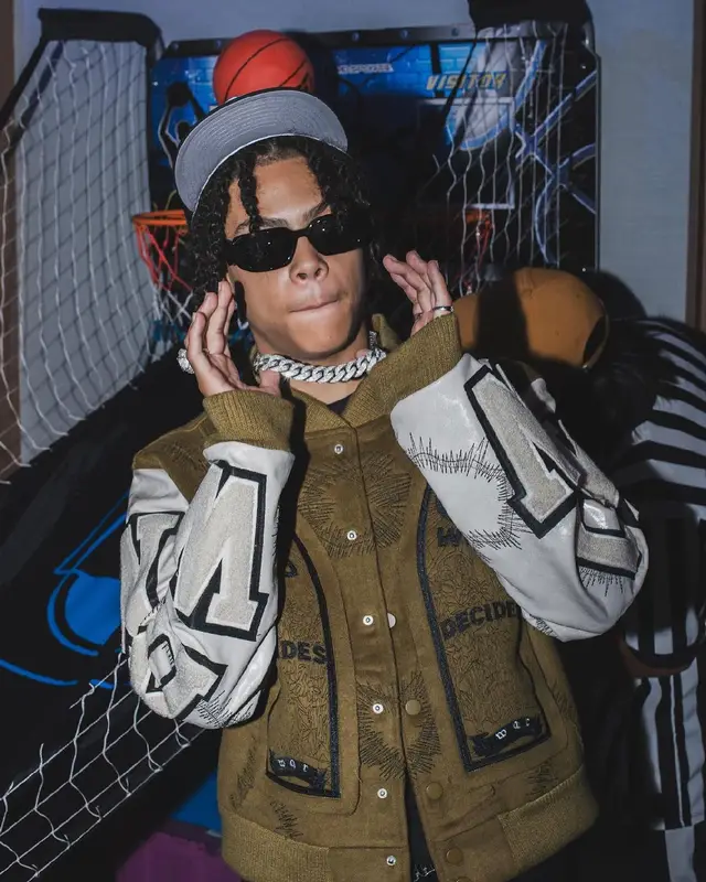 SugarHill Ddot outfit in Who Decides War, Amiri, and Prada, 2024