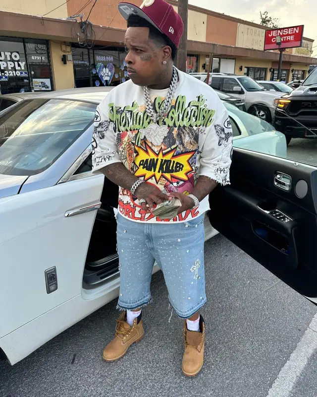 Finesse2tymes outfit in Timberland, Supreme, and Hanes, 2024