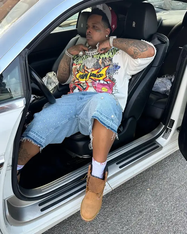 Finesse2tymes outfit in Timberland, Supreme, and Hanes, 2024
