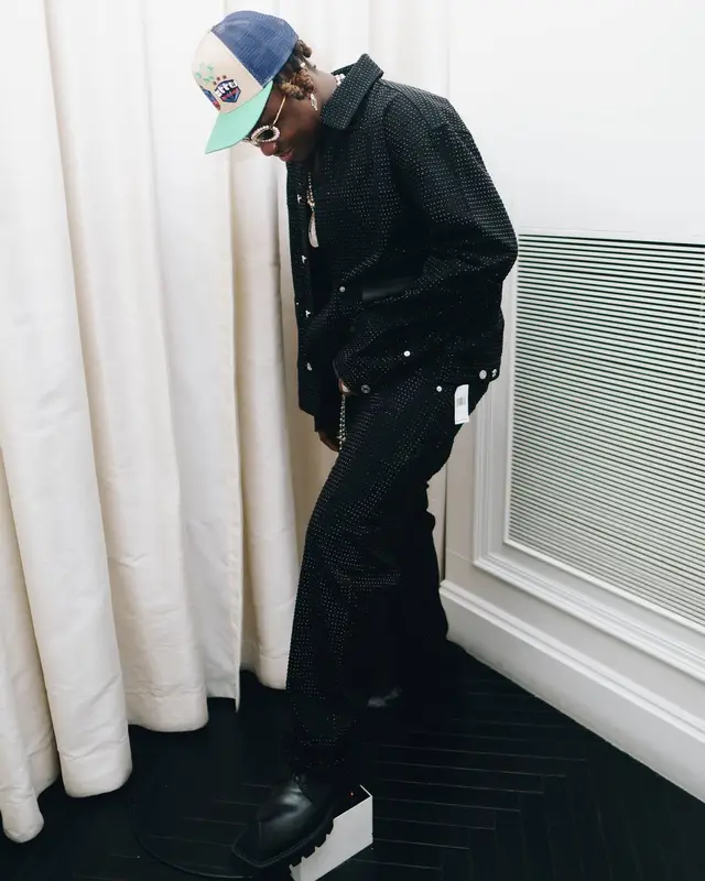 Zlatan outfit in Purple Brand, Balenciaga, and Louis Vuitton, 2024