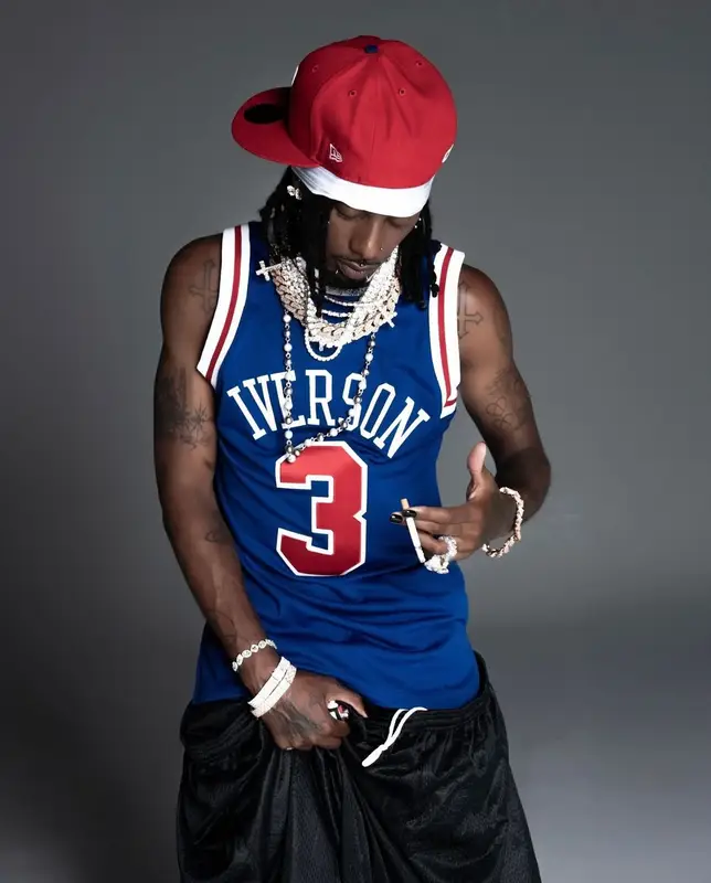 Playboi Carti outfit in Mitchell & Ness and Philadelphia 76ers Merch, 2024