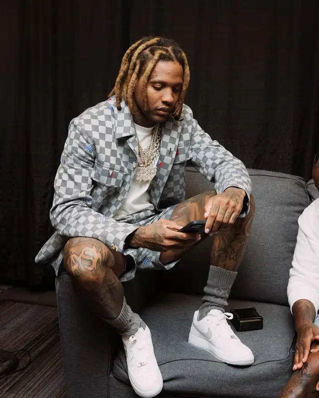Lil Durk outfit in Louis Vuitton and Nike, 2024