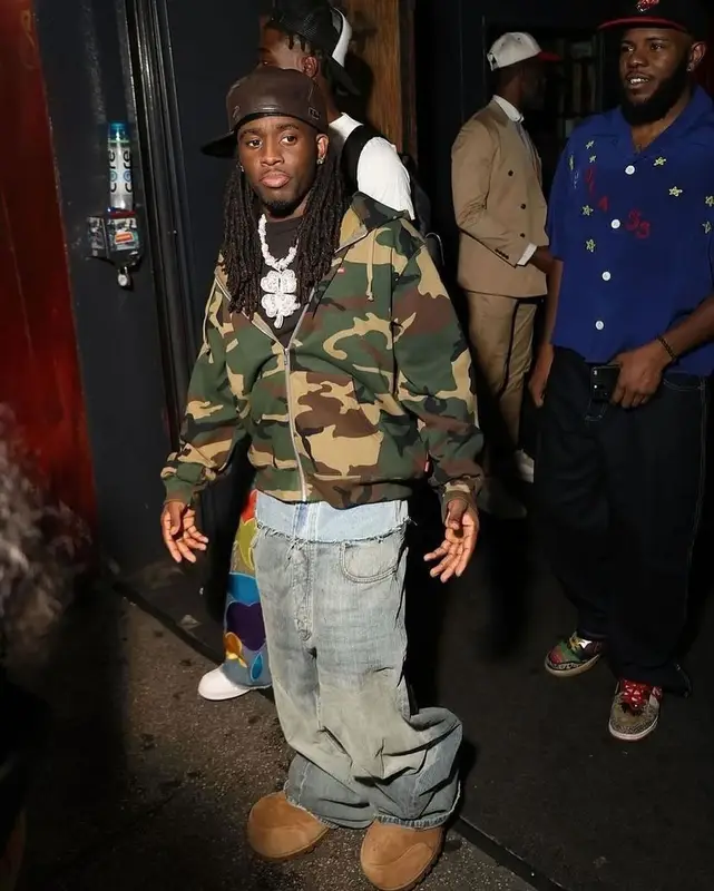 Kai Cenat outfit in Supreme, Balenciaga, and New Era, 2024