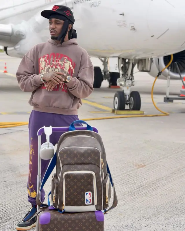 Quavo outfit in Louis Vuitton, Apple, and NBA, 2024