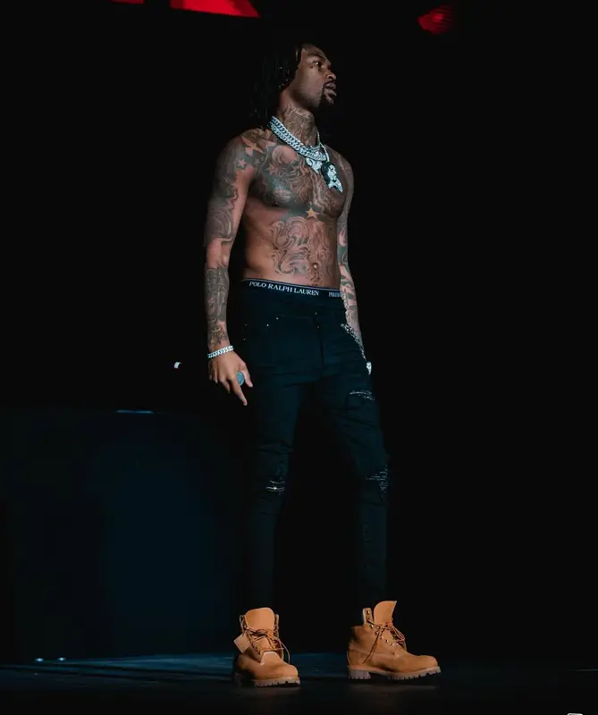 Hunxho outfit in Polo Ralph Lauren, Amiri, and New Era, 2024