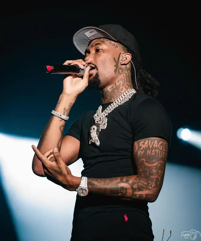 Hunxho outfit in Polo Ralph Lauren, Amiri, and New Era, 2024