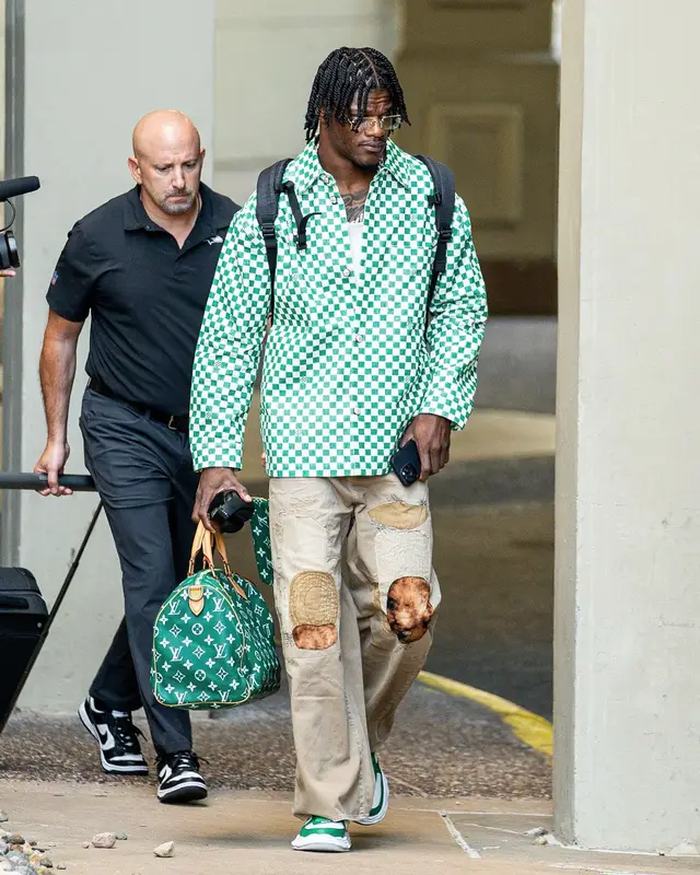 Lamar Jackson outfit in Louis Vuitton, Kapital, and Maison Mihara Yasuhiro, 2024