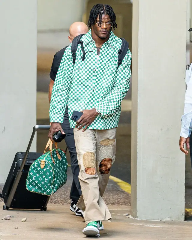 Lamar Jackson outfit in Louis Vuitton, Kapital, and Maison Mihara Yasuhiro, 2024