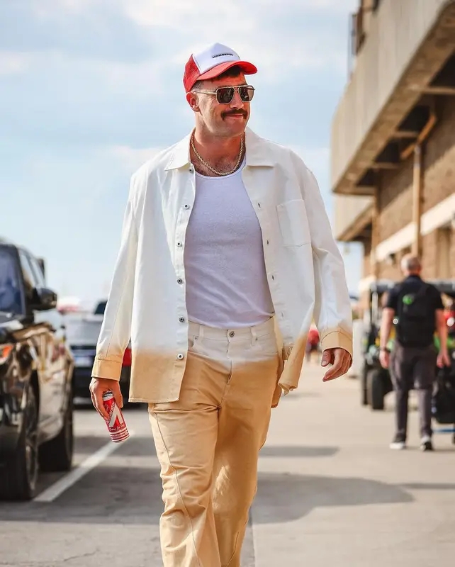 Travis Kelce outfit in Lanvin, Nike, and Bottega Veneta, 2024