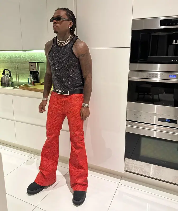 Gunna outfit in Versace, Gucci, and H&M, 2024