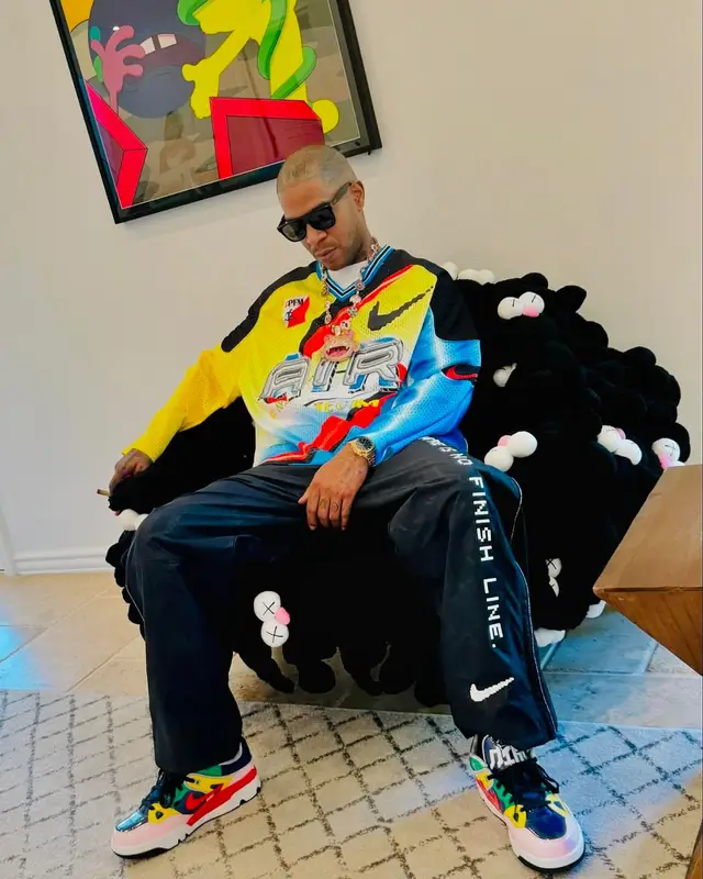 Kid Cudi outfit in Nike, Retrosuperfuture, and Cactus Plant Flea Market, 2024