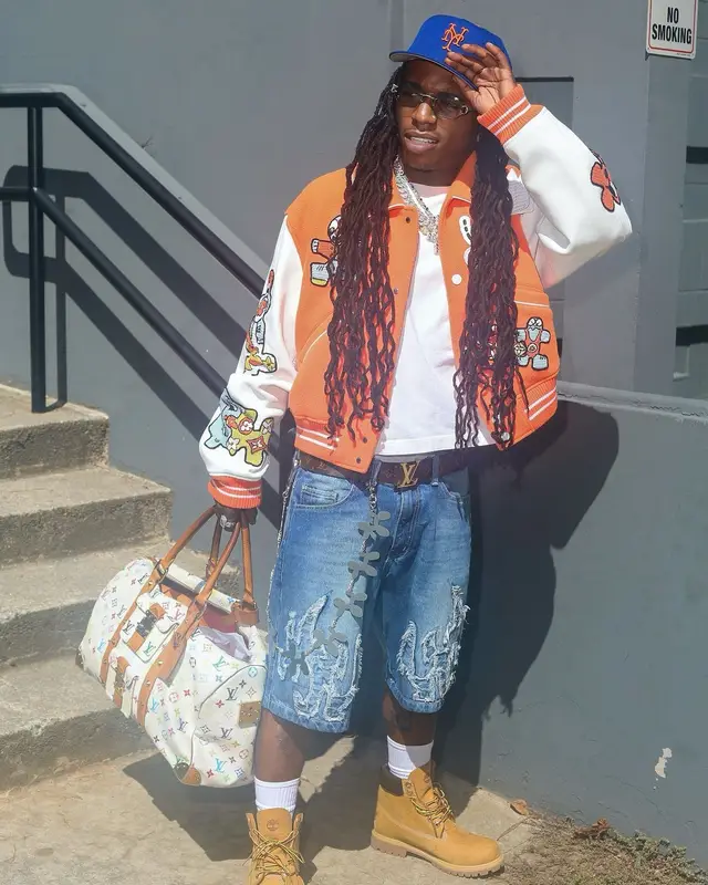 Jacquees outfit in Louis Vuitton, Timberland, and New Era, 2024