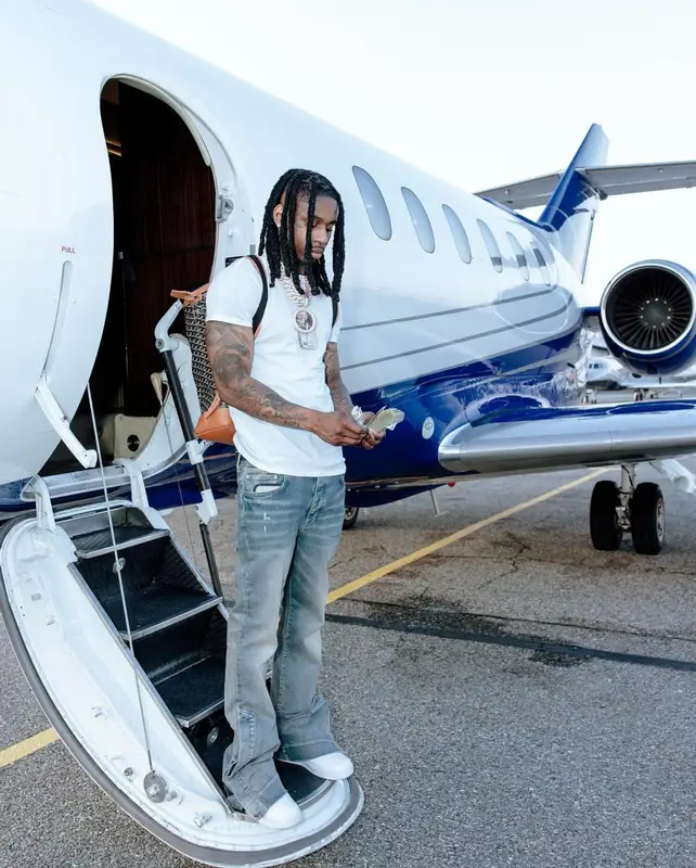 Polo G outfit in Amiri, Nike, and Goyard, 2024