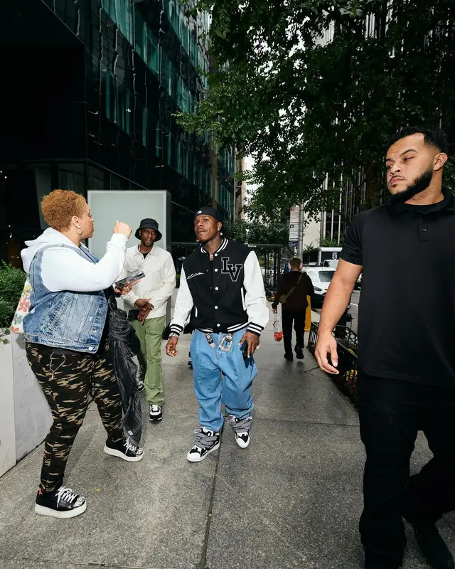 DaBaby outfit in Louis Vuitton, B.B. Simon, and Prada, 2024