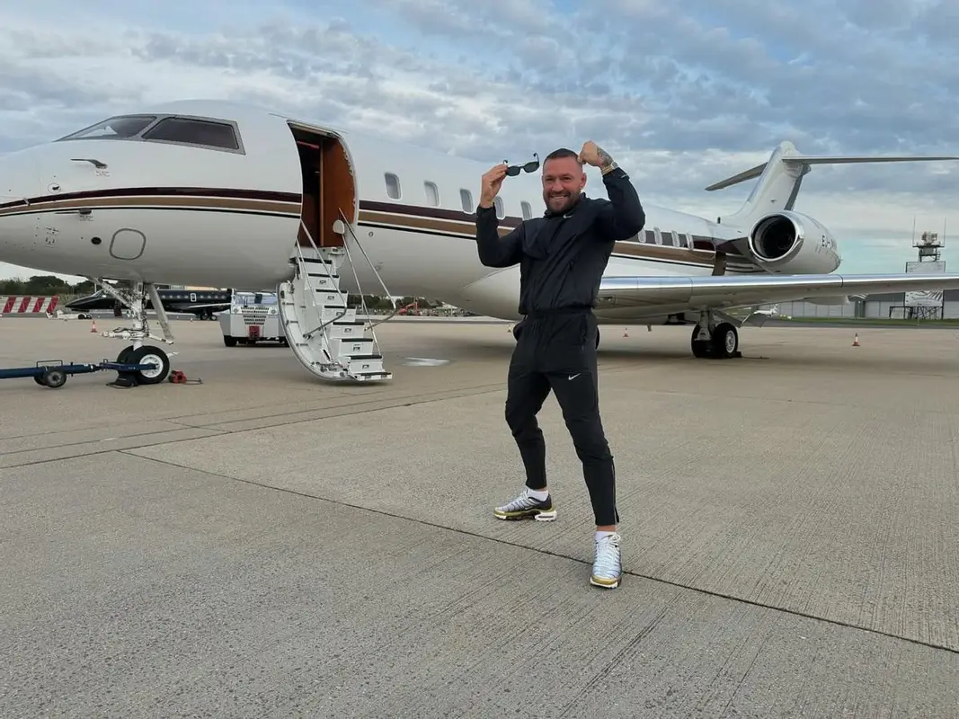 Conor McGregor outfit in Nike, Patek Philippe, and Versace, 2024
