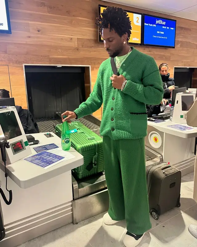 Saint JHN outfit in Maison Margiela, Marni, and Rimowa, 2024