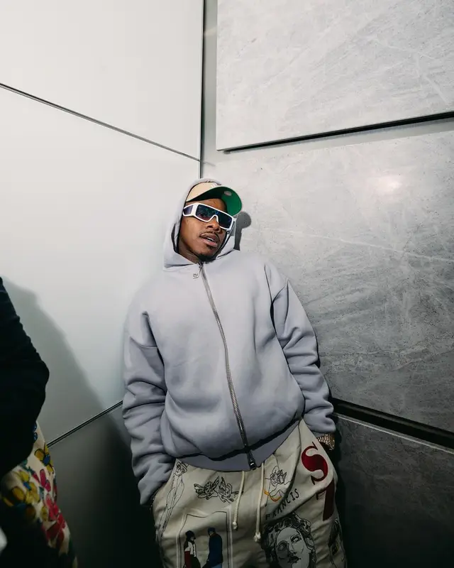 DaBaby outfit in Jordan, Louis Vuitton, and New Era, 2024