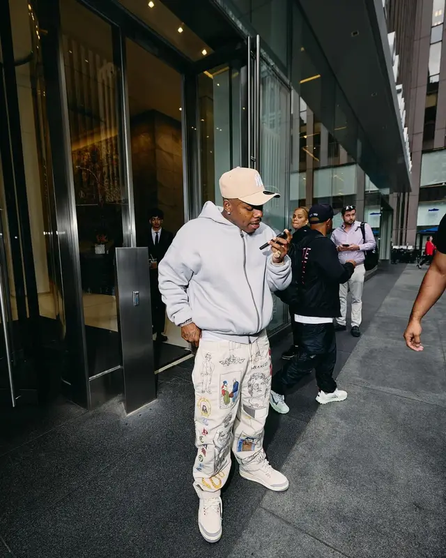 DaBaby outfit in Jordan, Louis Vuitton, and New Era, 2024