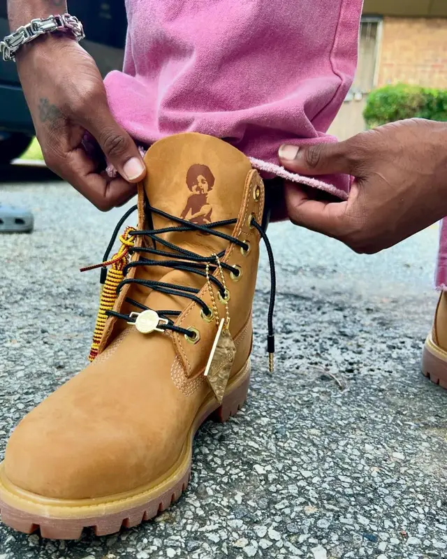 Yung Mal outfit in Timberland, Zara, and The Notorious B.I.G. Merch, 2024