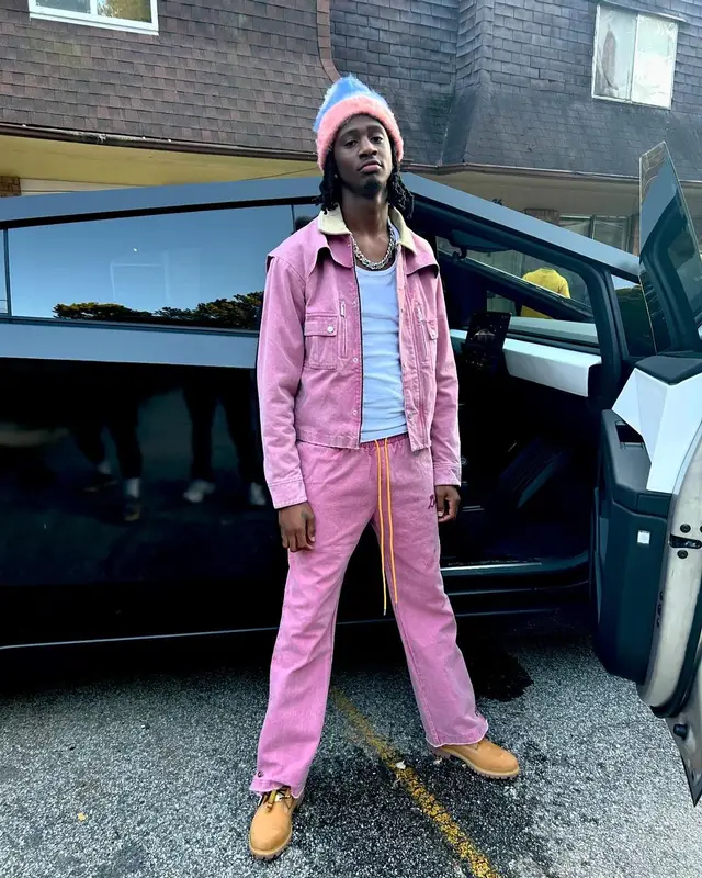 Yung Mal outfit in Timberland, Zara, and The Notorious B.I.G. Merch, 2024