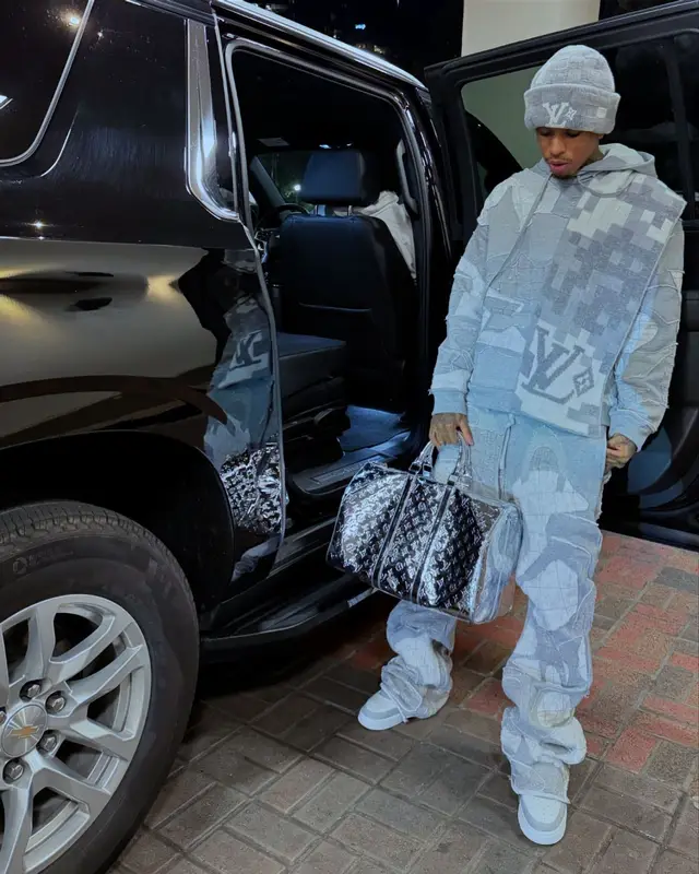 NLE Choppa outfit in Who Decides War, Louis Vuitton, and Calvin Klein, 2024