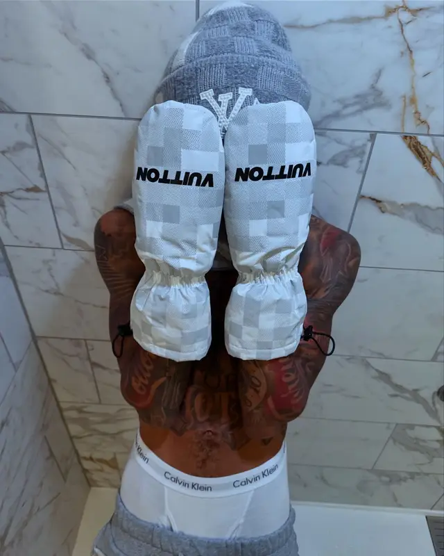 NLE Choppa outfit in Who Decides War, Louis Vuitton, and Calvin Klein, 2024