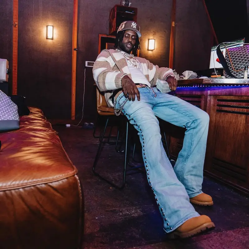 Chief Keef outfit in Timberland, Louis Vuitton, and Jon Stan, 2024