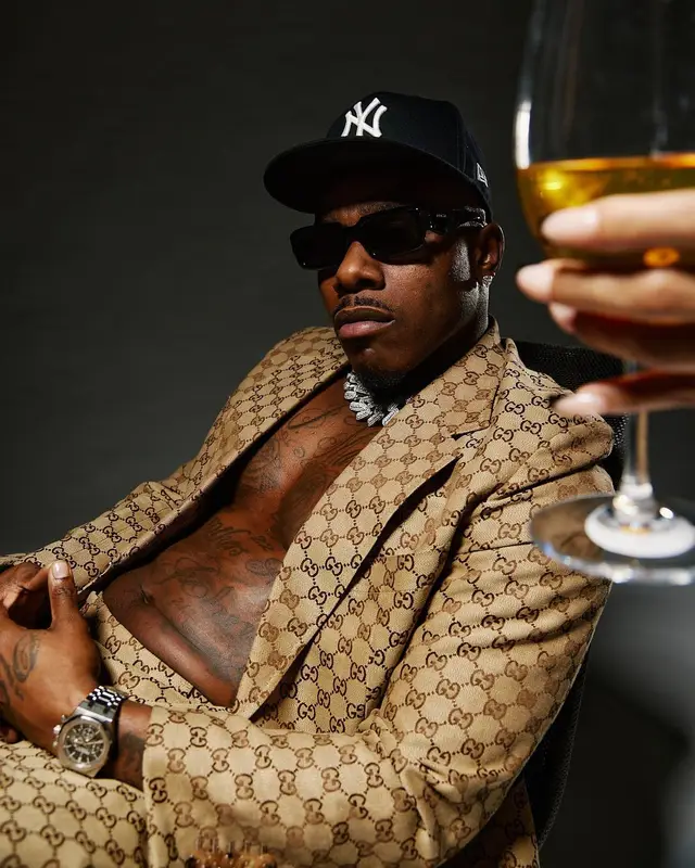 DaBaby outfit in Gucci, Prada, and New Era, 2024