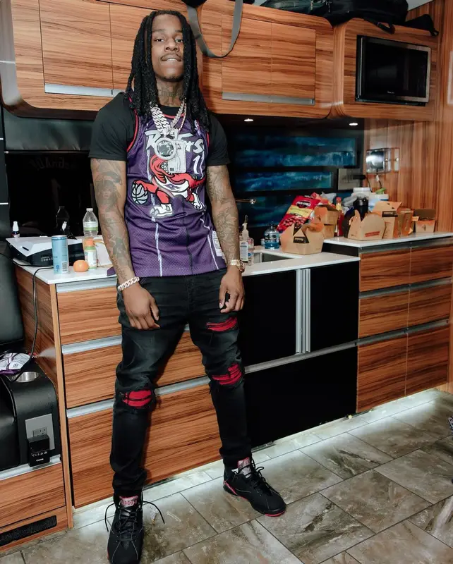 Polo G outfit in Mitchell & Ness, Amiri, and Jordan, 2024
