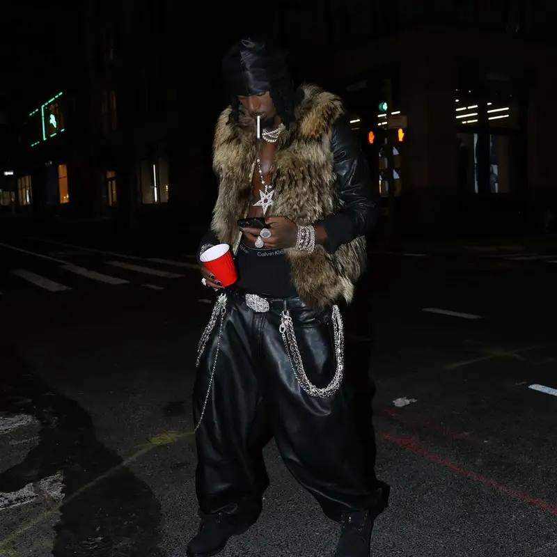 Playboi Carti outfit in Balmain, Chrome Hearts, and Calvin Klein, 2024